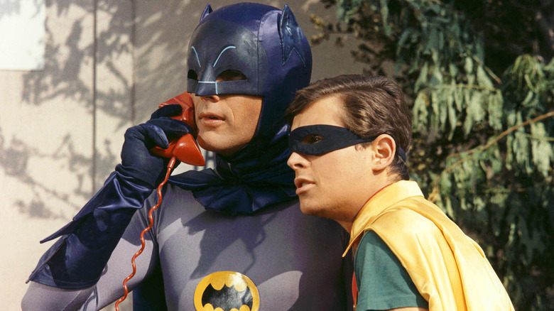 Adam West Batman and Burt Ward Robin on phone