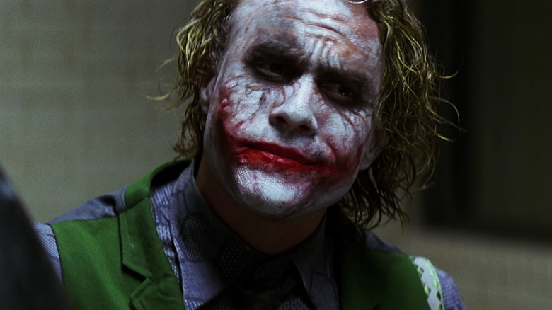 Joker talking to Batman