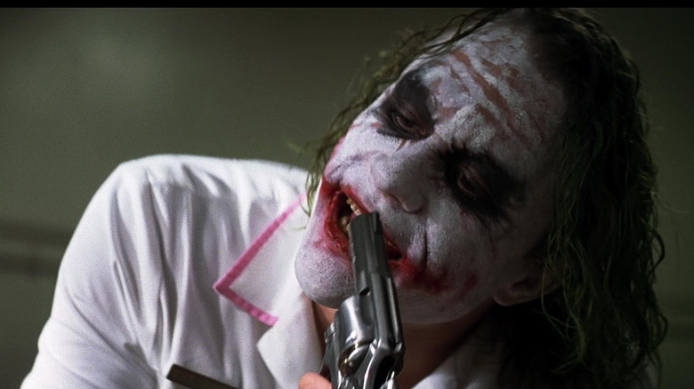 Joker talking to Harvey