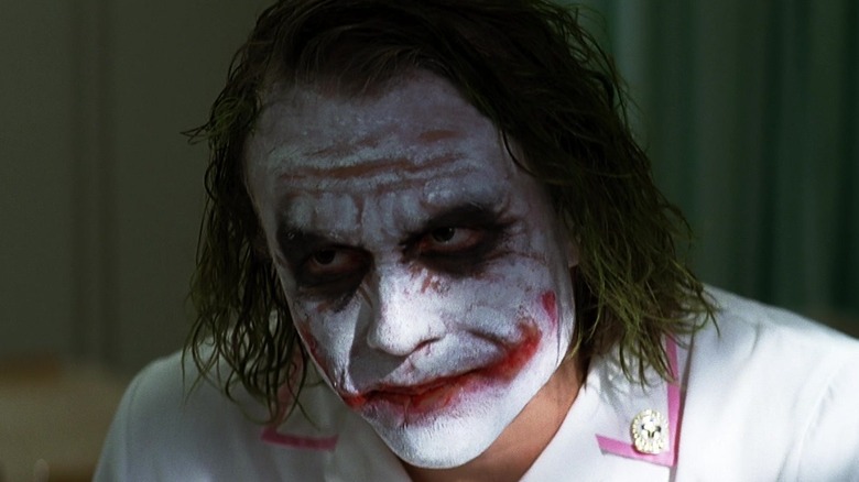 Joker talking to Harvey