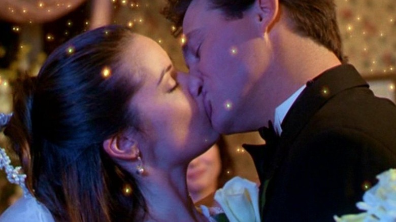 Piper and Leo kiss