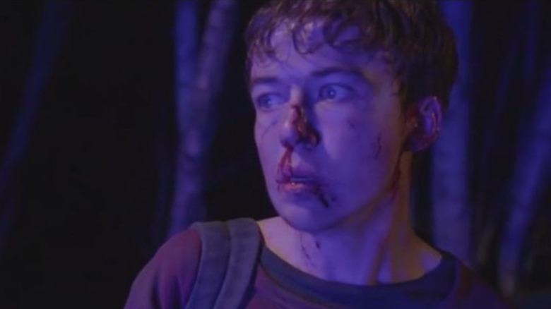 Alex Lawther bloodied terrified