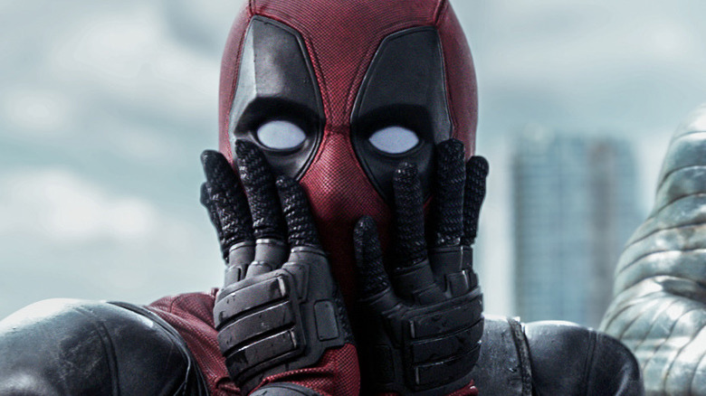 Deadpool slapping his face in shock