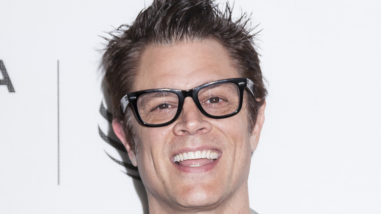 Johnny Knoxville in glasses smiling
