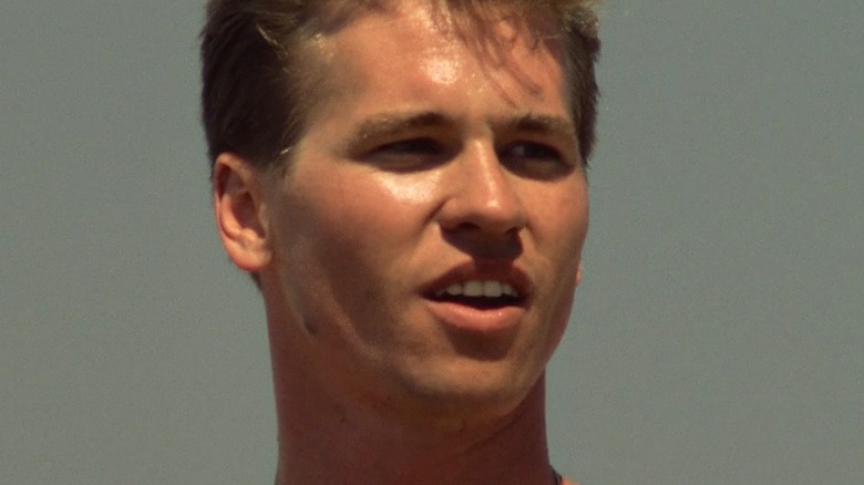 Iceman shirtless playing volleyball