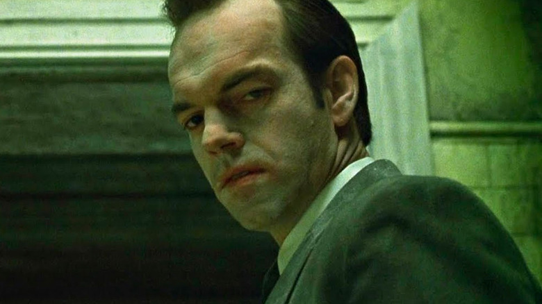 Agent Smith looking on