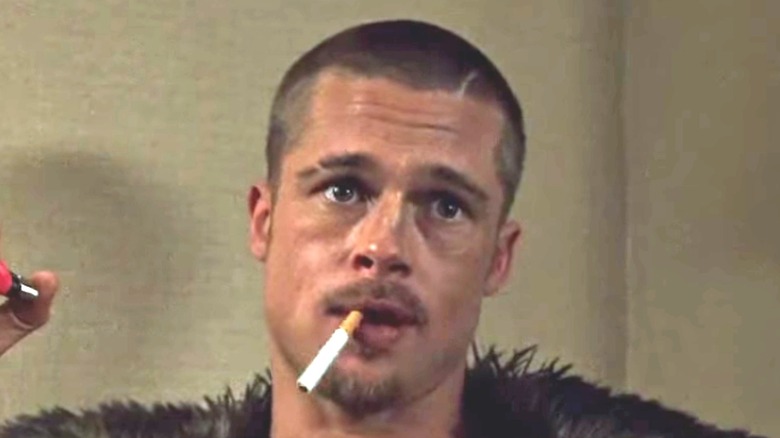 Pitt as Tyler smokes in Fight Club