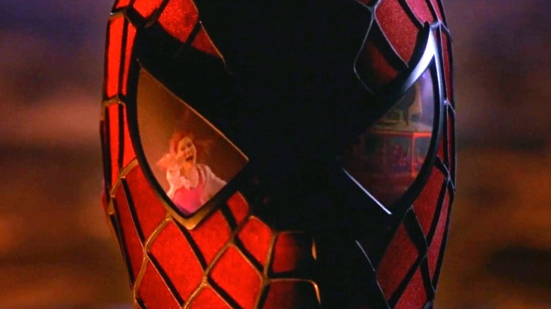 Spider-Man mask with MJ and trolley reflections