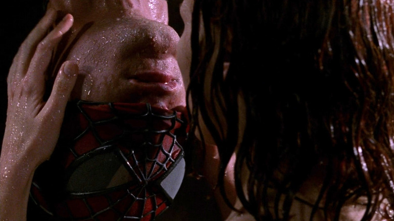 Spider-Man and MJ kissing in rain