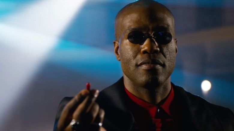 Morpheus holding the red pill