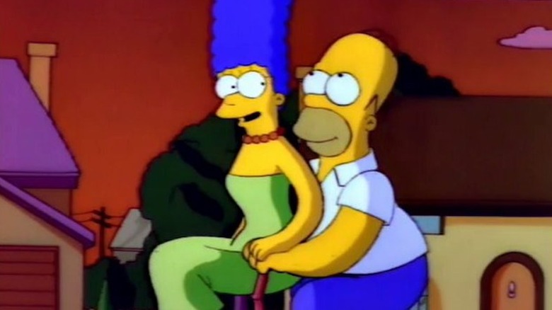 Homer and Marge on a bicycle in "Duffless" on "The Simpsons" (1993)