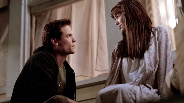 Landon looking at Jamie