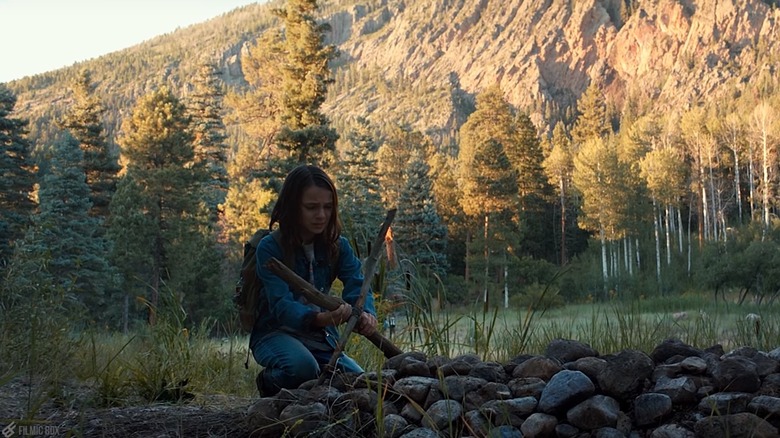 Laura building Logan's grave