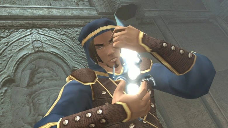 A man holds a glowing dagger