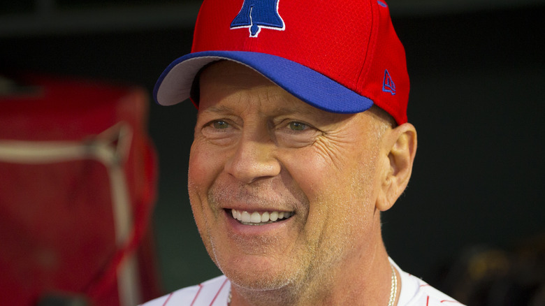 Bruce Willis at a baseball game