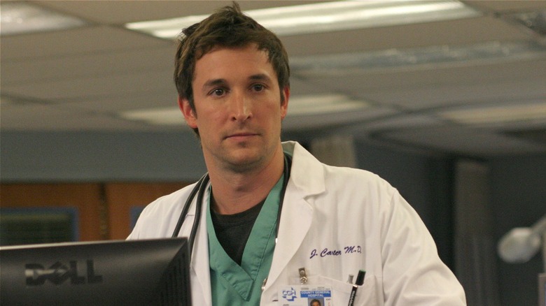 John Carter standing in the reception area in ER (2005)