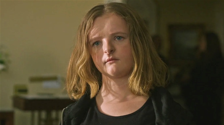 Charlie looking sad at funeral in Hereditary