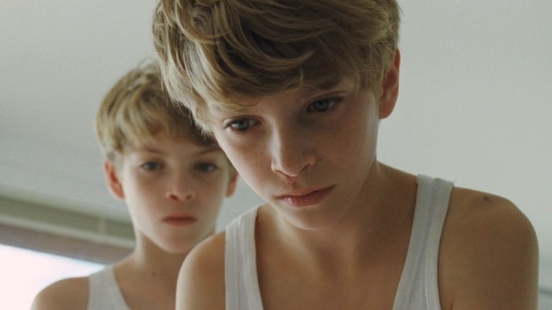 Elias and Lukas lean over the bed in "Goodnight Mommy" (2014)