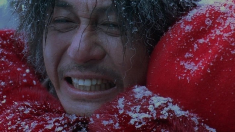 Dae-su grimaces as Mi-do embraces him in "Oldboy" (2003)