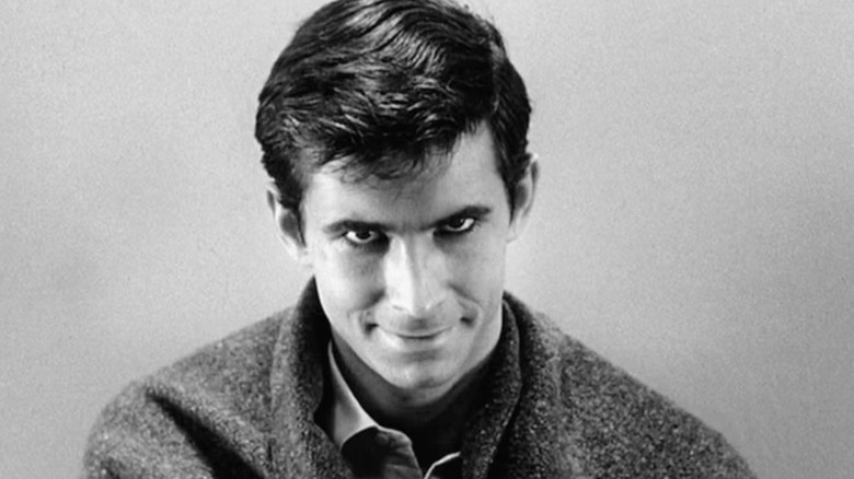 Norman Bates smiles to himself in "Psycho" (1960)