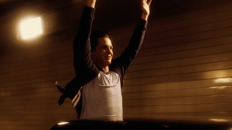 Charlie stands up in the back of the truck in "The Perks of Being A Wallflower" (2012)