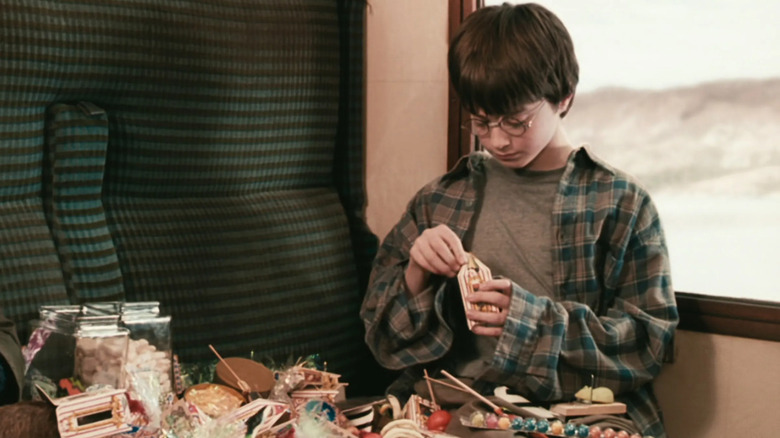Harry eating sweets on the Hogwarts Express (2001)