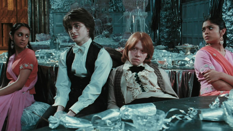 Harry and Ron's dates giving them dirty looks at the Yule Ball