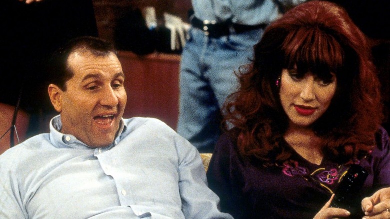 Ed O'Neill as Al Bundy and Katey Sagal as Peg Bundy on Married with Children