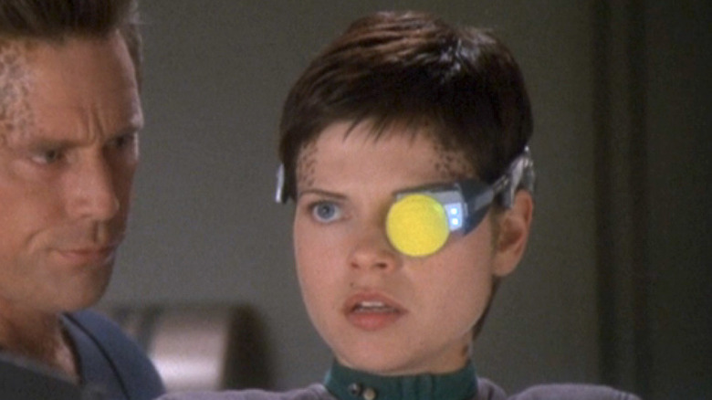 Ezri wears a monocle