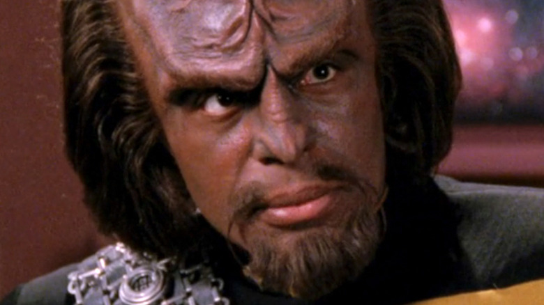 Worf looks at Riker