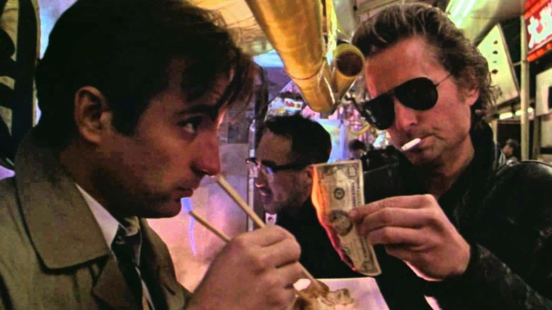 Conklin burns a hundred dollar bill