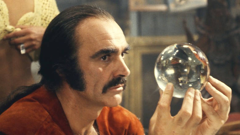 Zed holds a crystal ball in 