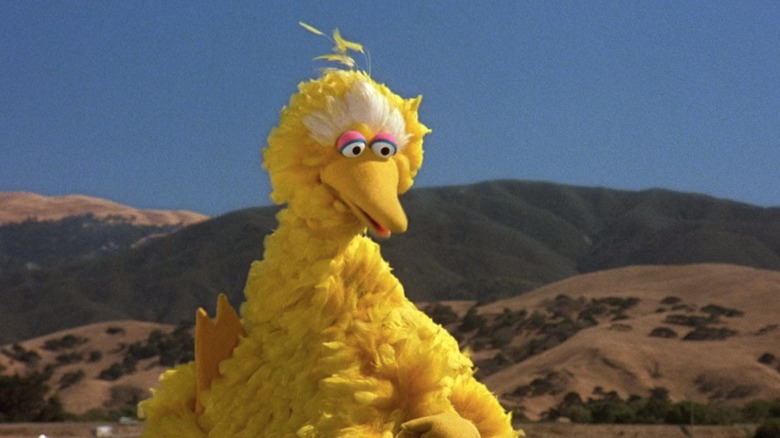 Big Bird talking to Fozzie Bear
