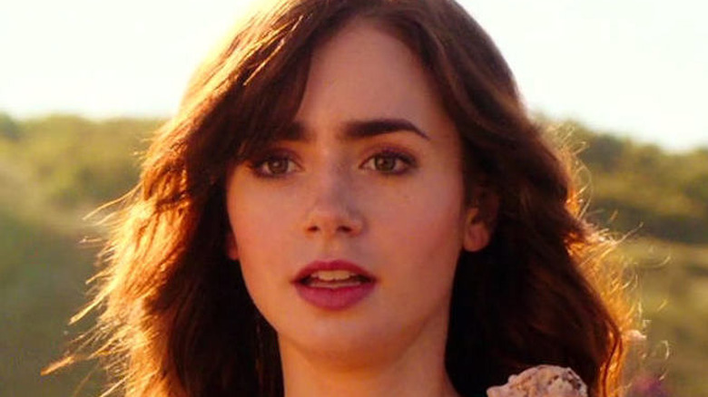 Lily Collins gasps in Love, Rosie