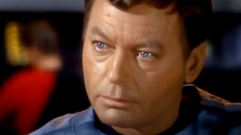 DeForest Kelley as Leonard McCoy on Star Trek