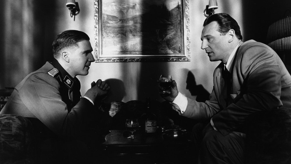 Ralph Fiennes and Liam Neeson as Amon Göth and Oskar Schindler