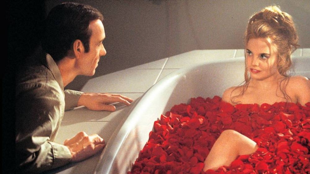 Kevin Spacey and Mena Suvari as Lester Burnham and Angela Hayes in American Beauty