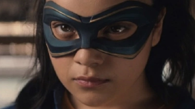 Ms Marvel wearing a mask