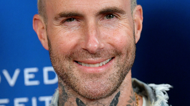 Adam Levine smiling