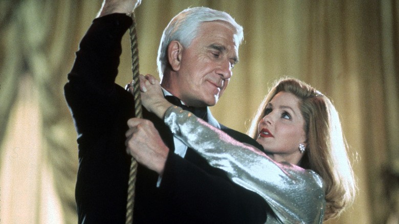 Frank and Jane Drebin prepare to swing from the rafters in "Naked Gun 33 1/3: The Final Insult"