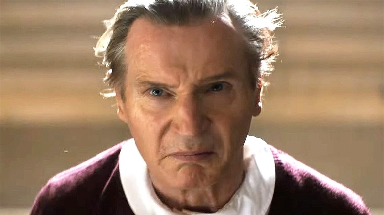 Frank Drebin Jr. scowls in his schoolgirl disguise in 