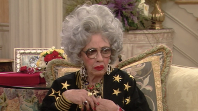 Yetta gazes to the side