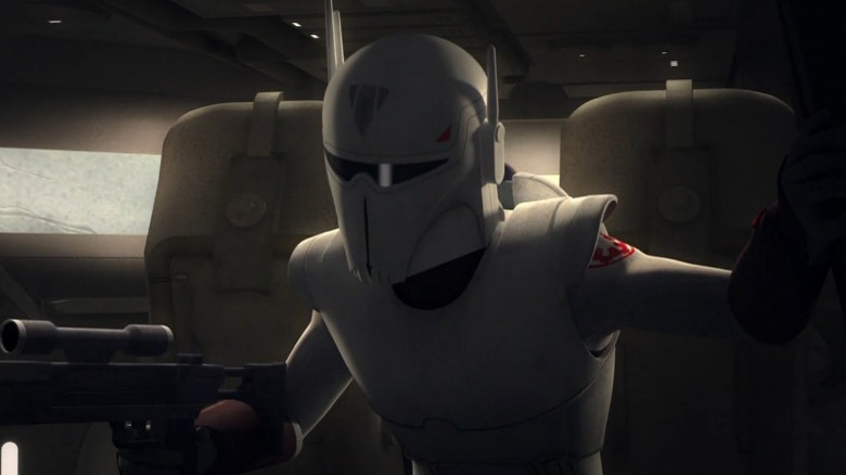 Captain Hark holding a blaster