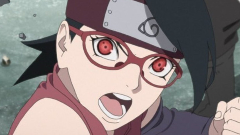 Sarada throwing punch