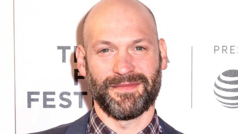 Corey Stoll gets his picture taken at a premier