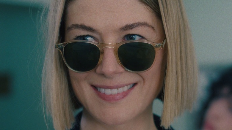 Rosamund Pike smiling with sunglasses 