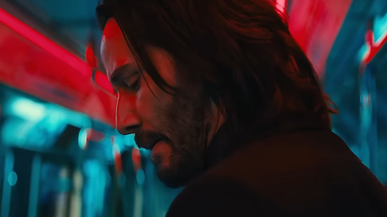 John Wick looking over his shoulder