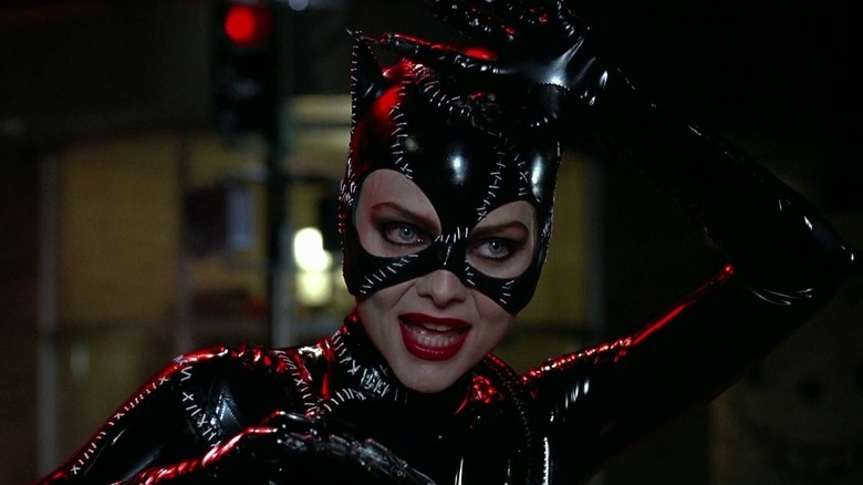 Catwoman with her claw in the air