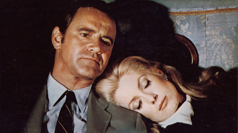 Catherine Gunther resting her head on Howard Brubaker's shoulder in The April Fools
