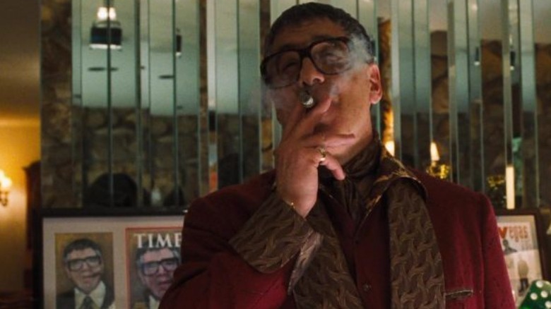 Reuben smokes in Ocean's Eleven